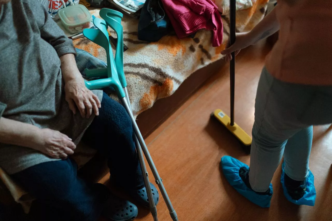 Caregiver assisting with daily living support